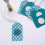 Teal and white wax seal gift tags