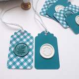 Teal and white wax seal gift tags