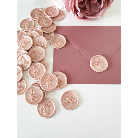 Blush pink wedding wax seals