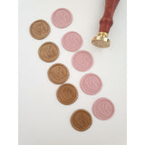 Love wax seals in pink and gold